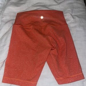 Orange lulu lemon biking shorts size 6